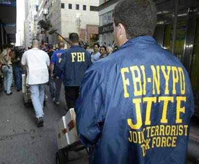 Archival photograph of FBI and FBI-NYPD Joint Terrorist Task Force officers walking along a city street